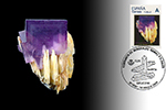 Tarjeta con el matasellos dedicado a la barita en el Certamen de minerales, gemas y fósiles de Oviedo 2025